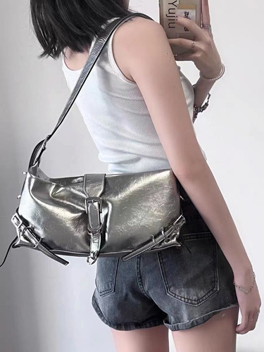 A trendy, versatile workwear crossbody bag in silver matte mirror finish with dopamine accents, perfect for matching a single-shoulder bag and taking photos on the go.