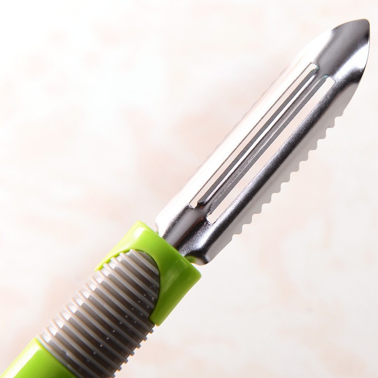 Fábrica directa de plástico largo Bing pelador cocina multifuncional de acero inoxidable pelador de Un yuan suministro al por mayor