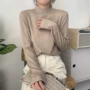 秋冬别致半高领卷边毛衣
