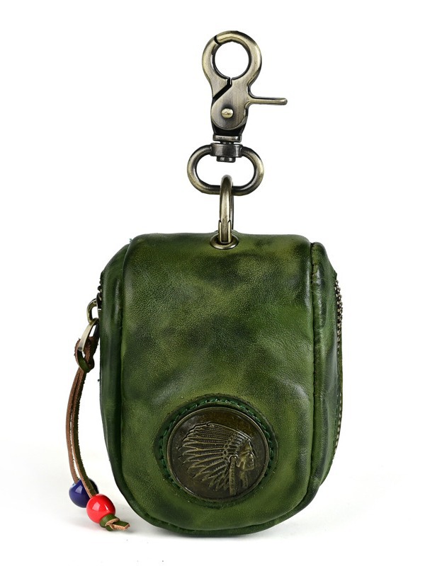 古潮客のレトロな頭の層の牛革の自動車の鍵の包みの女性の腰は手を掛けてなめの本革の家庭用の鍵の包みを植えます。