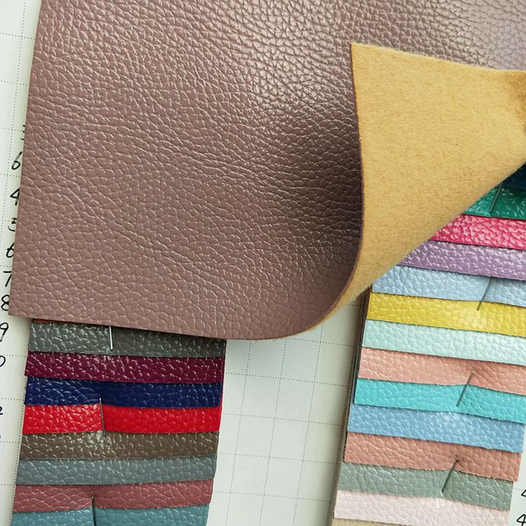 亮面荔枝纹皮革面料L5928箱包手袋包装革PVC荔枝纹皮革油皮荔枝纹