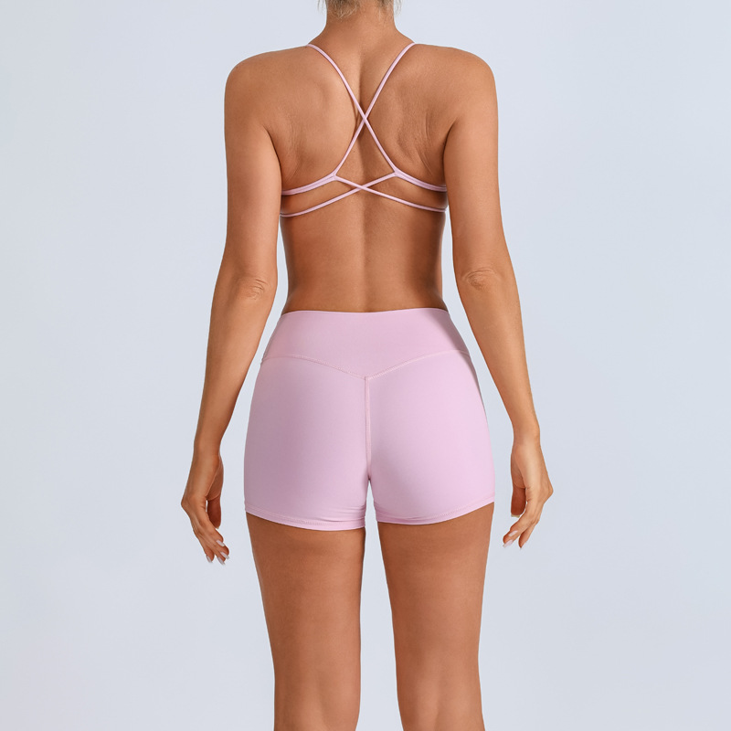 Traje de yoga europeo y americano transfronterizo, espalda hermosa con almohadilla para el pecho, sujetador con tirantes cruzados, pantalones deportivos de secado rápido de melocotón de cintura alta