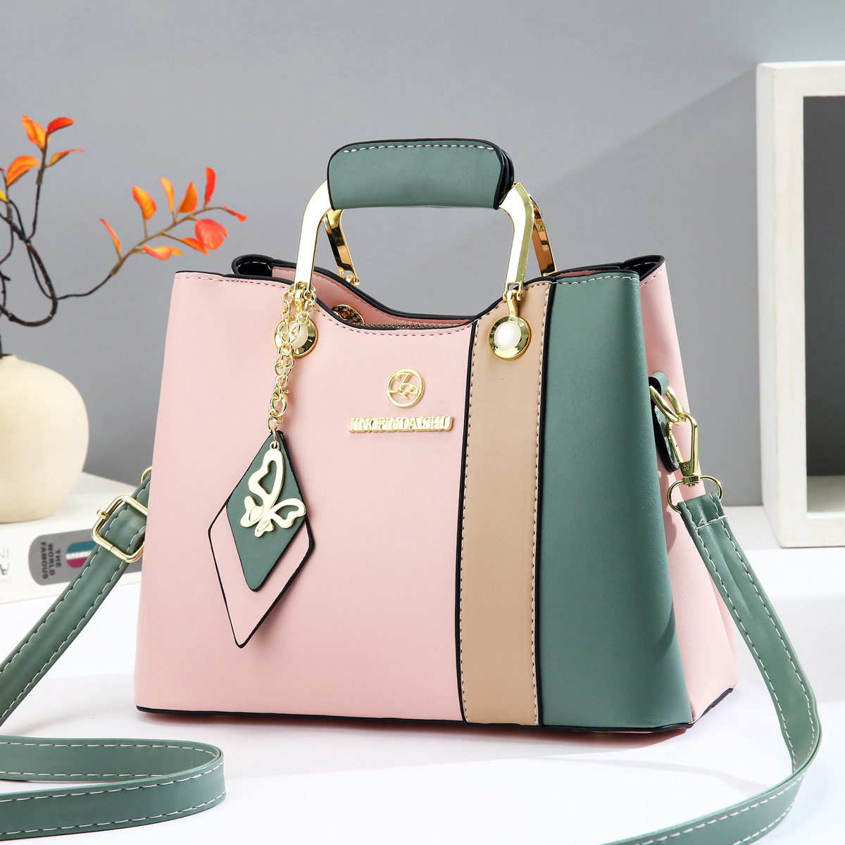 2025 nuevo bolso de mujer de mediana edad de color en contraste bolso de axila casual de todo fósforo bolso de madre de temperamento bolso de mensajero portátil de un solo hombro