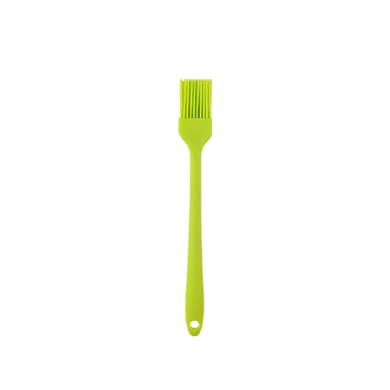 green oil brush