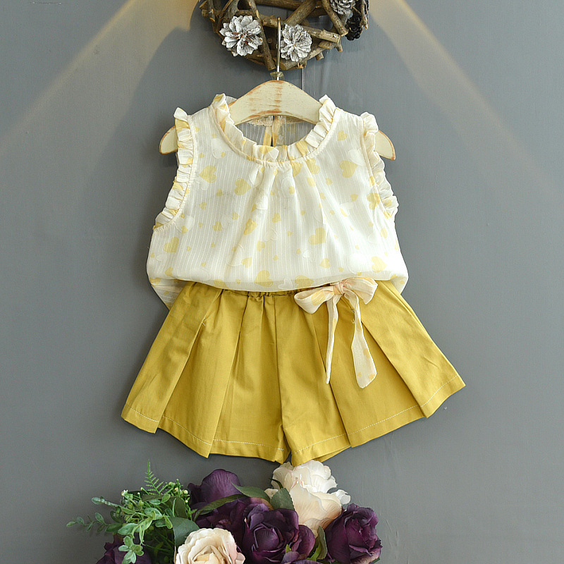 노란색 큰 물방울 무늬 민소매 슈트