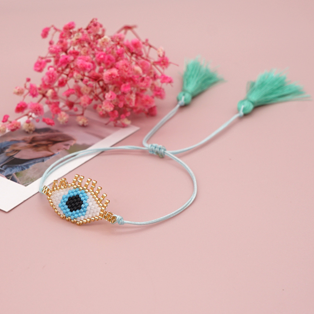 2021 Einfache Mode Miyuki Reis Perlen Hand Gewebte Türkische Blaue Augen Ethnischen Stil Paar Armband Frauen display picture 4