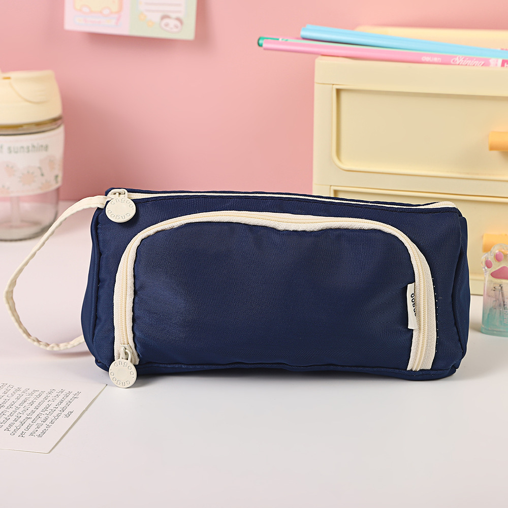 Bolso para lápices con ventana triangular transfronteriza Versión coreana de la caja de papelería de color sólido simple Bolsa de papelería de gran capacidad multifuncional creativa