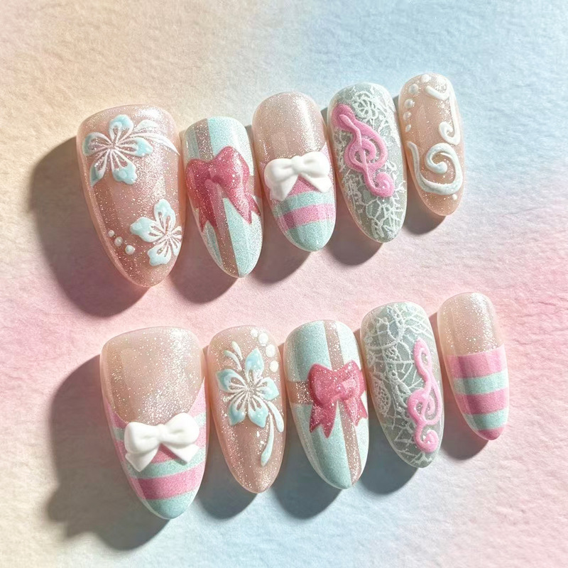 Mint pink striped vintage girl-style press-on nails with chunky pink cat-eye almond-shaped 3D musical note nail patches Mint pink striped vintage girl-style press-on nails with chunky pink cat-eye almond-shaped 3D musical note nail patches
