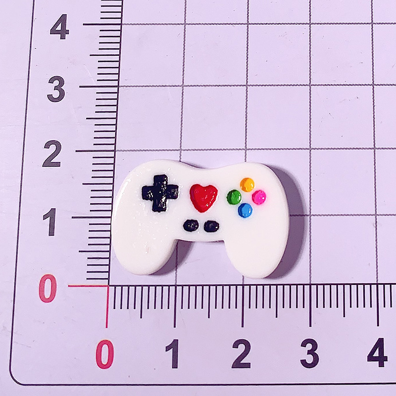 Simulación transfronteriza en blanco y negro mango de máquina de juegos DIY accesorios de resina cabello caja de papelería hebilla de zapato material de parche