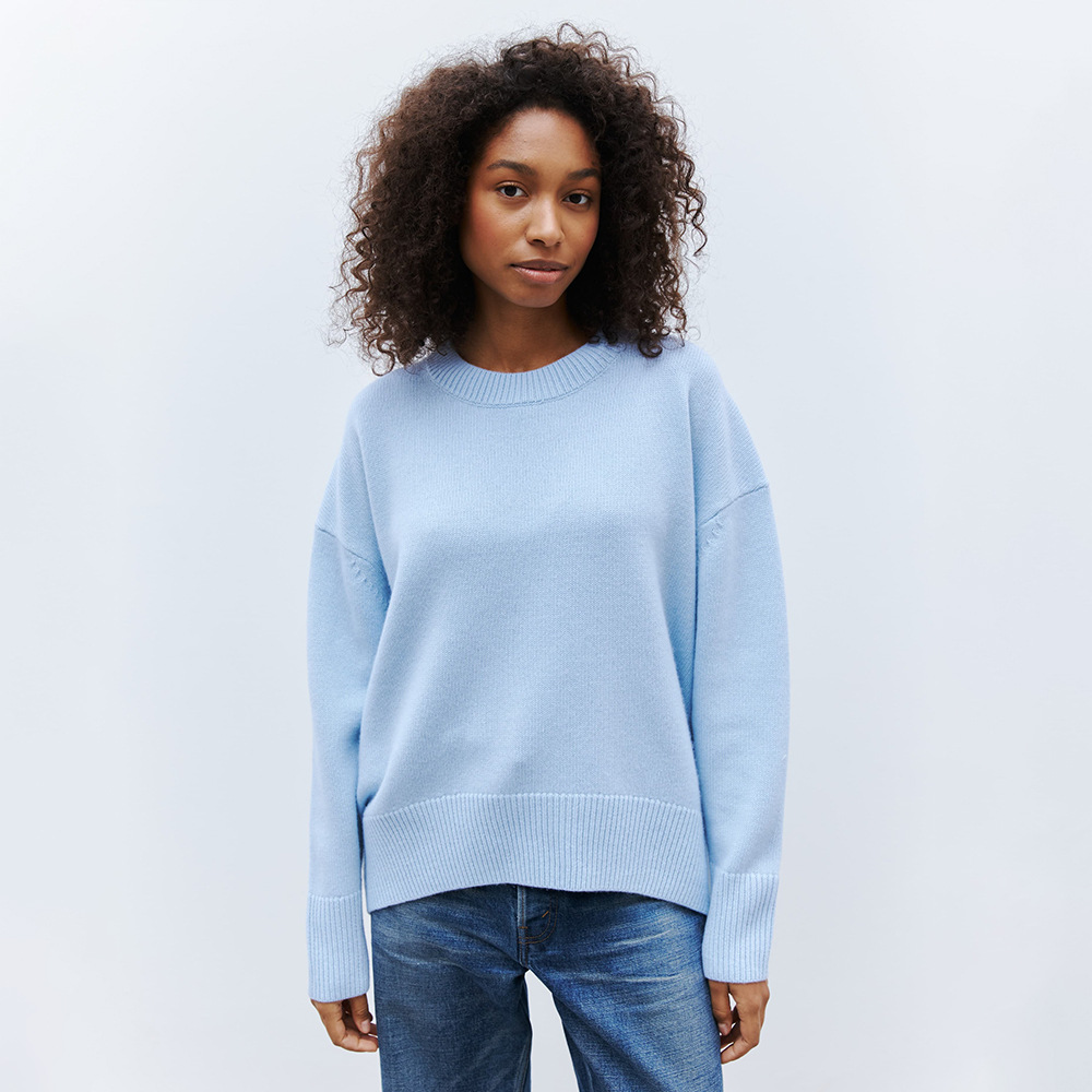 Suéter de manga larga de cuello redondo transfronterizo para mujeres Europa y los Estados Unidos 2025, otoño y invierno nuevo estilo simple camisa de punto de color sólido suéter suelto