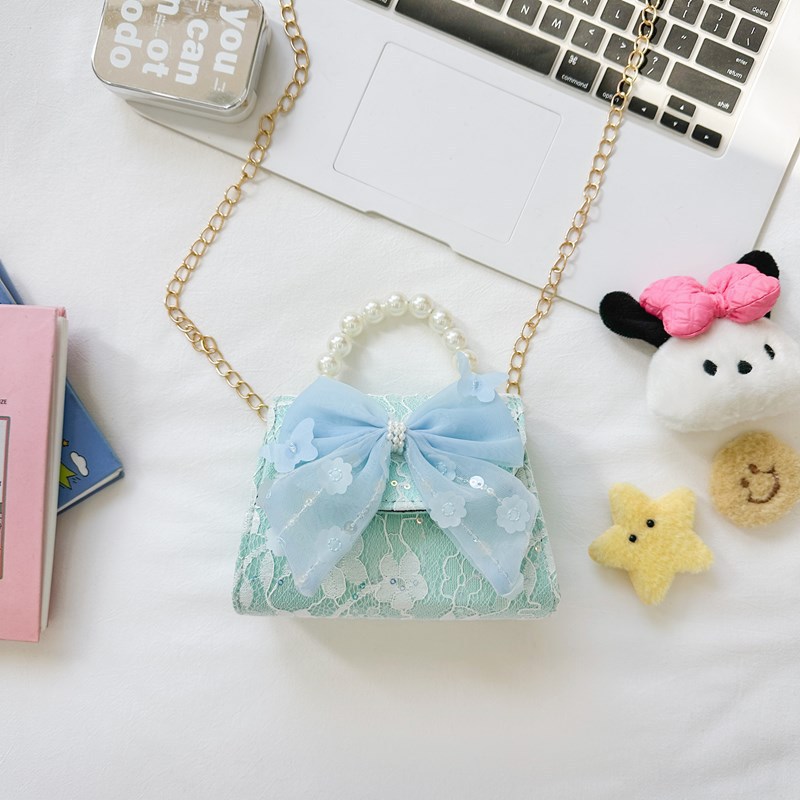 Bonito pequeño viento de la princesa viento bolso de perlas bolso de mano bolso de hombro para niños arco