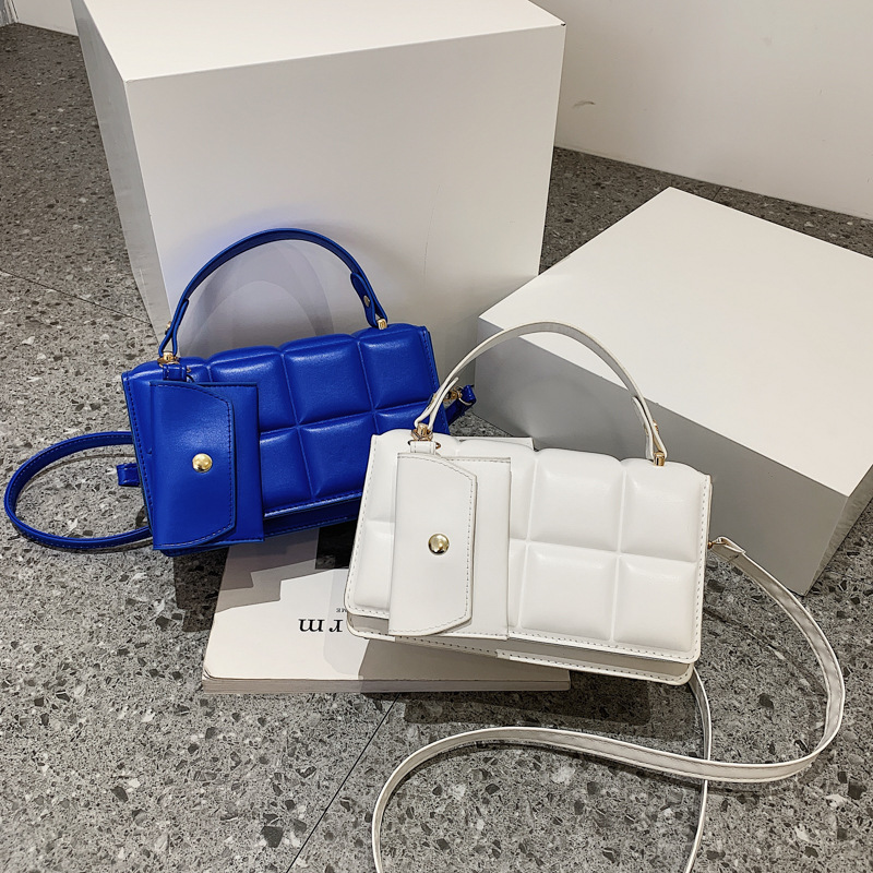 Bolso pequeño de indentación popular transfronterizo bolso a cuadros de estilo occidental de moda de las mujeres bolso de mensajero simple de color sólido bolso de la madre y el niño