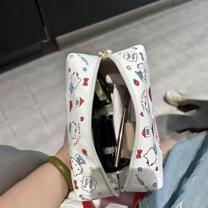 Helloikitty bolsa de maquillaje portátil de gran capacidad de viaje Sanrio almacena encantador nicho de dibujos animados en el viento