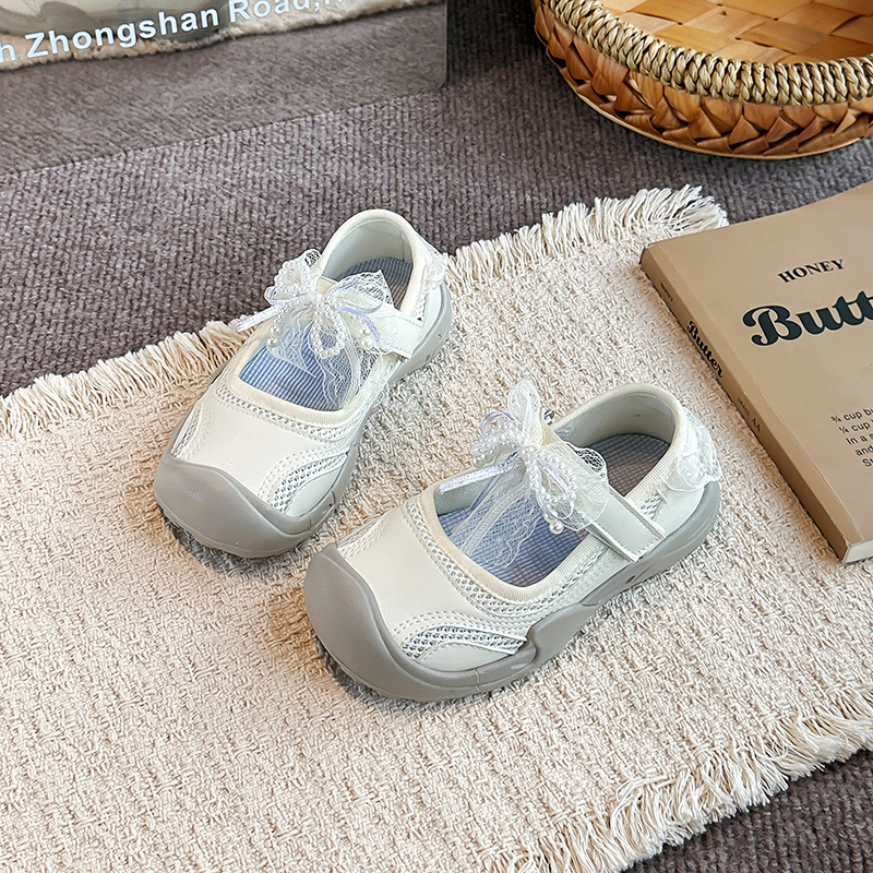 Sandálias de arco para niñas 2026 verano nuevo estilo de niños princesa de viento suave anti-deslizante zapatos de playa huecos zapatos de Lefour