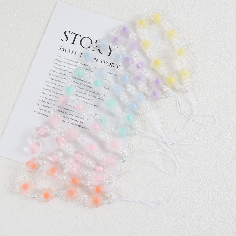 Flor cordón DIY teléfono móvil Shell cadena hecha a mano con cuentas fresca pequeña flor colgante cadena joyería decorativa cadena colgante