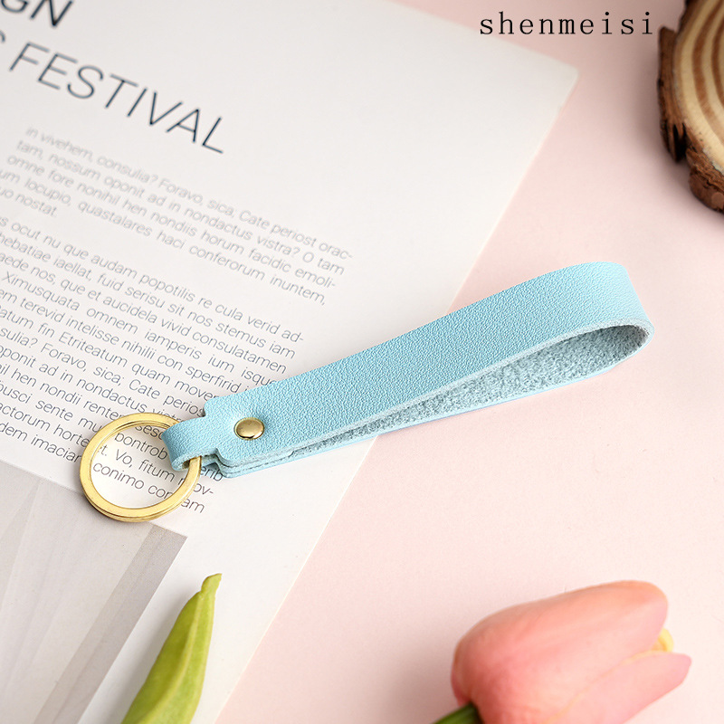 Keychain de cuero pu transfronterizo estilo simple de mano hebilla de cuero logotipo imprimible colgante de cuero llavero para hombres y mujeres