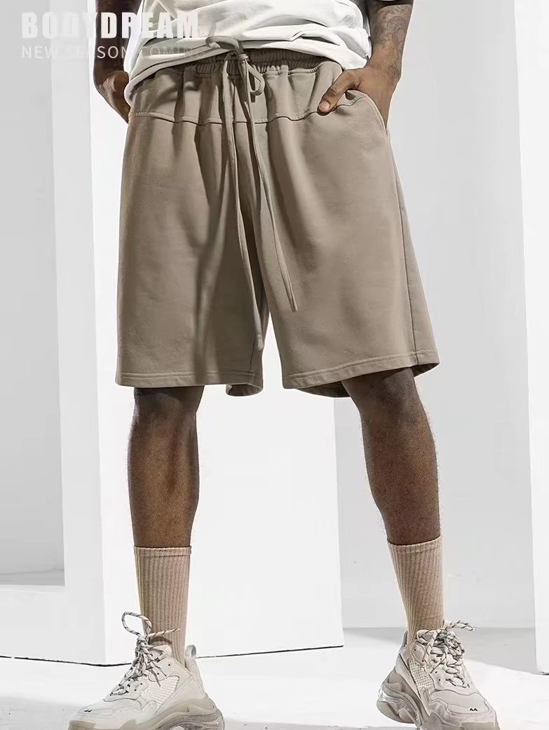 Pantalones cortos casuales de verano para hombres, marca de moda ins, color sólido, color de contraste simple, pantalones deportivos de cinco puntos colgantes rectos sueltos casuales