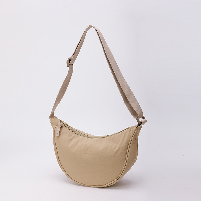 Bolso de tela pequeño bolso de moda ligero bolso de mochila de nylon transfronterizo mujer bolso de hombro casual versátil bolso de bolsas de bolsas de bollo de gran capacidad