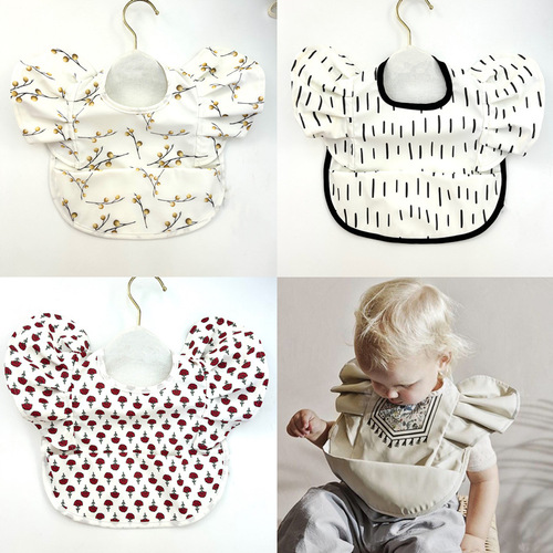 ins European and American new baby rice bag children's large bib ruffled three-dimensional princess polka dot wings flying sleeve bib