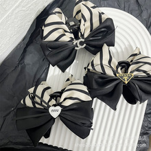 �¿���ڰחl�y�����Y�l�AŮ�߼��н��ٿ�����A��߅�l��^�