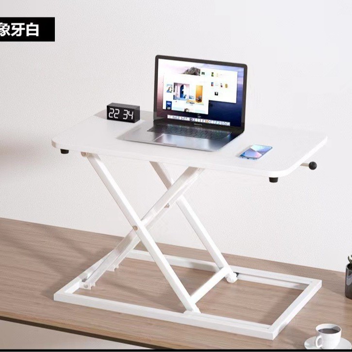 立っているデスクの昇降コンピュータの机の折り畳みの机の上で気動のタイプのデスクトップはノートの小さいテーブルを高く上げます。|undefined