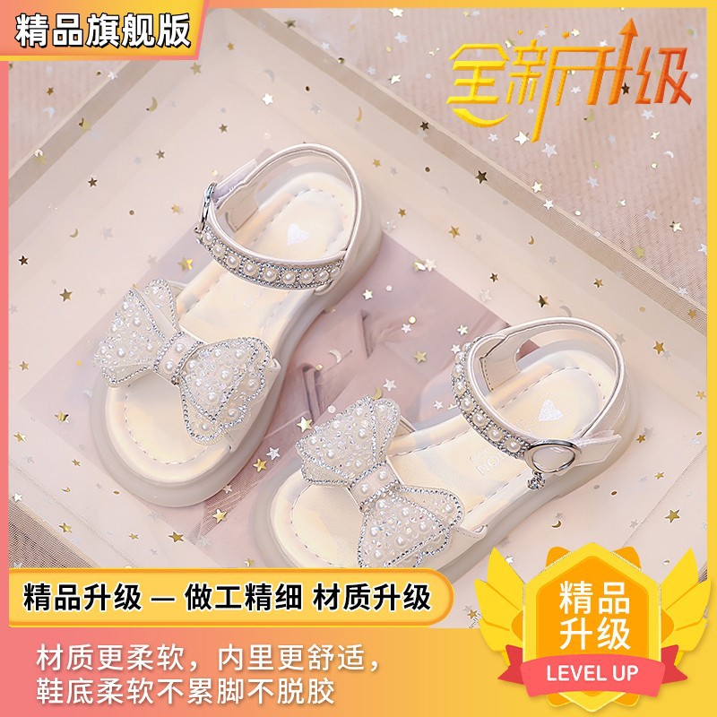 Niños verano 2026 nuevas sandalias de niñas arco brillante con base suave princesa sandalias de viento para niñas sandalias
