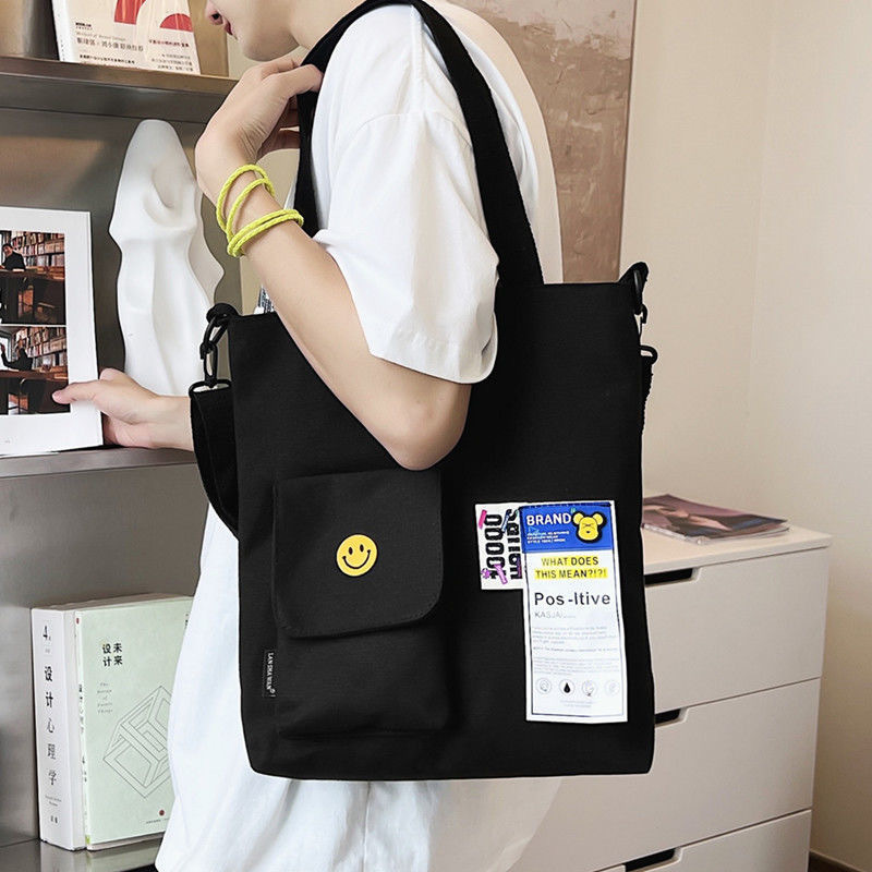 Nuevos hombres y mujeres de estudiante universitario bolsa de lona de moda crossbody bolsa de estilo coreano japonés casual bolsa de hombro de gran capacidad