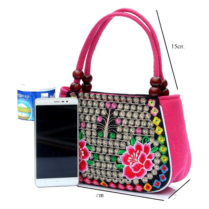 Directo de fábrica nuevo estilo étnico bordado bolsa cobre moneda flor pequeño bolso Yunnan bordado bolso especial Miao bordado bolsa