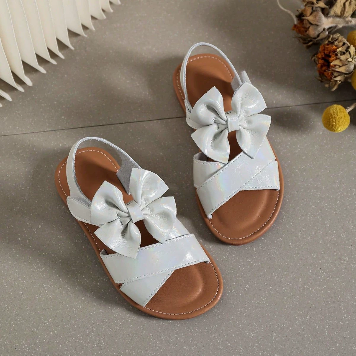 Трансграничный школьный стиль девушки повседневный тренд уютный и милый бант протекают на пляже плоские сандалии женская внешняя торговля