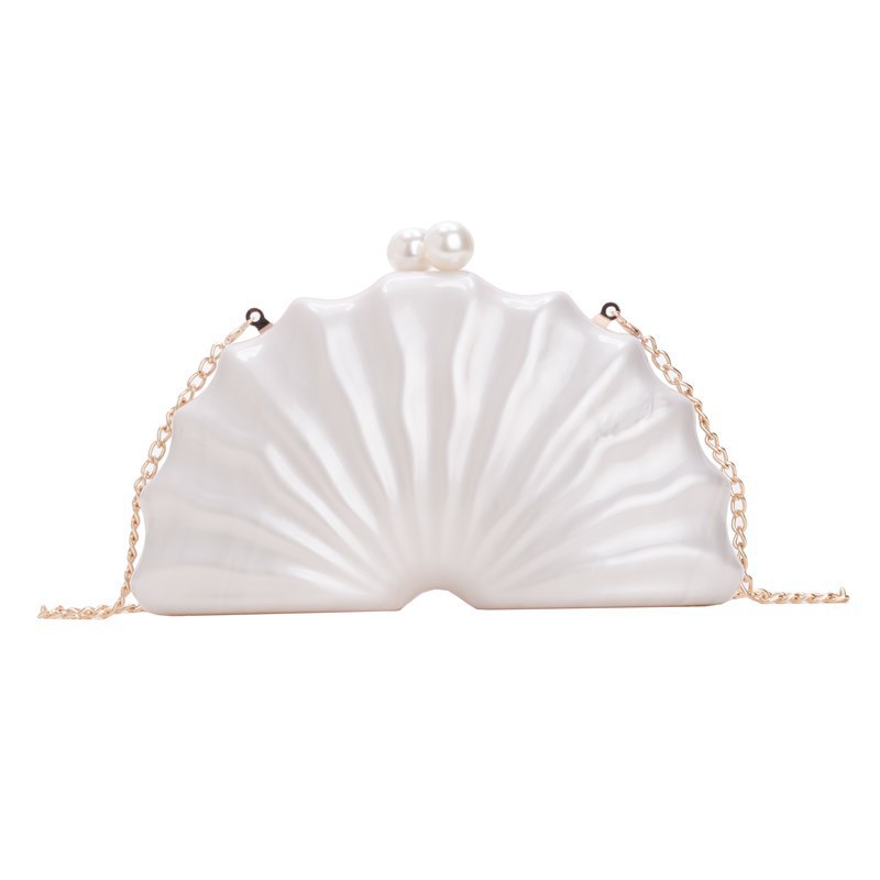 Europa y los Estados Unidos nuevos paquetes de cena de damas de hombro único en forma de concha acrílica de mano de lujo ligero paquete de moda de noche