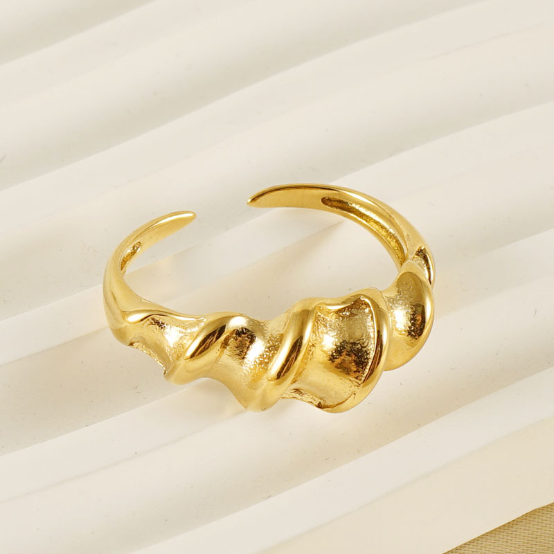 Anillo de torsión ajustable de acero de titanio francés transfronterizo hembra anillo de torsión de hilo irregular de personalidad simple europea y americana