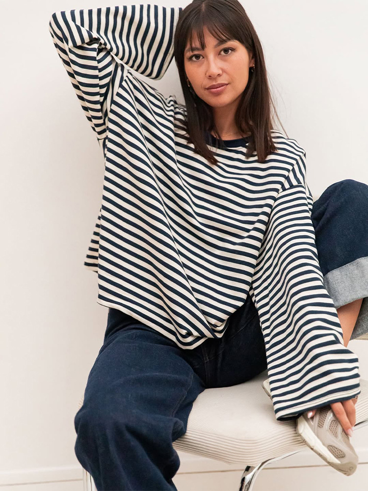 Moda universal relajado cuello redondo de manga larga rayas camiseta de punto 2025 otoño y invierno nuevo estilo europeo y americano transfronterizo