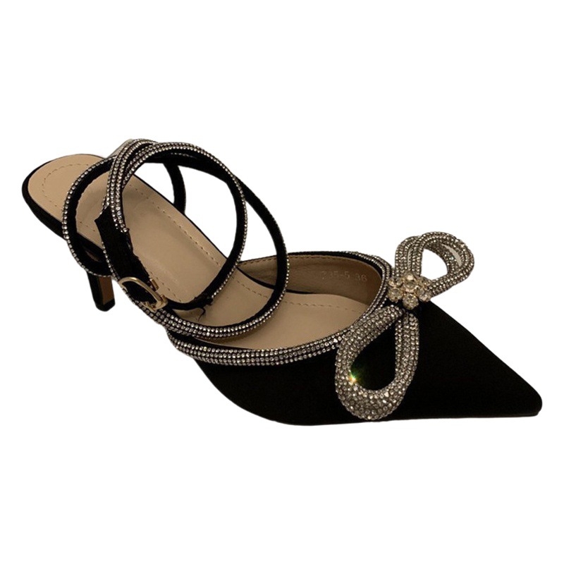 Tacones 2026 al por mayor transfronterizos para mujer, sandalias de tacón de aguja con lazo de diamantes de imitación, estilo francés, deslumbrantes, de punta fina y tacón alto.