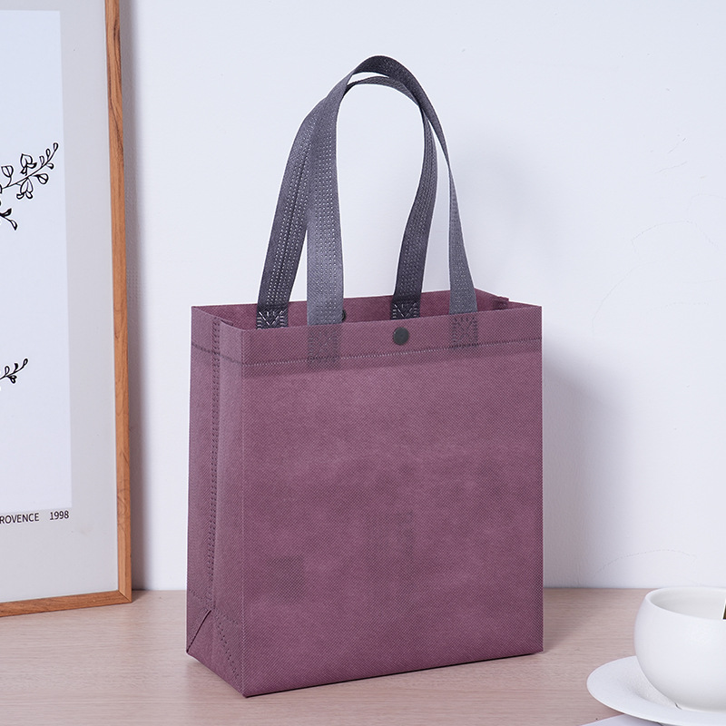 Bolsas de tienda de ropa de alta sensación bolsas de compras bolsas de mano personalizadas red especial no tejida ropa de mujer nueva bolsa de empaque image 1