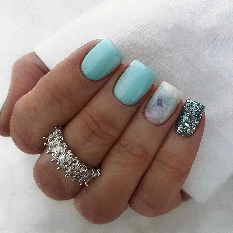 Light blue small fresh haze flowers with glitter nail art European and American ins style short fake nail nail art Light blue small fresh haze flowers with glitter nail art European and American ins style short fake nail nail art