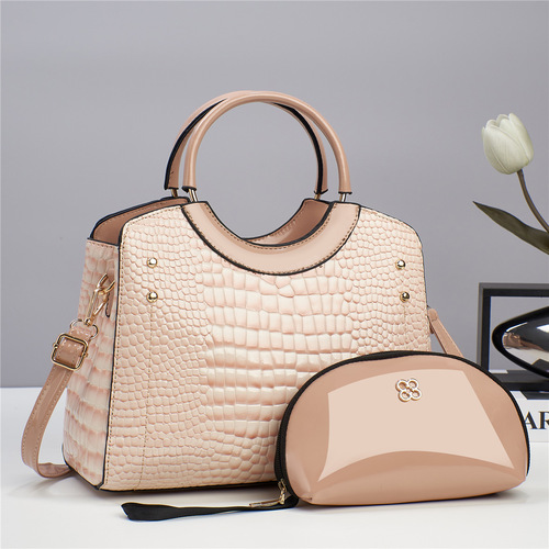 Handbag with python pattern, mother and daughter style, shiny leather platinum bag, fashionable unidirectional shoulder and crossbody bag for women.
