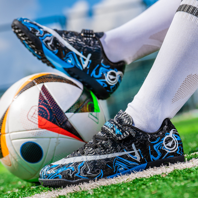 Zapatos de fútbol profesionales transfronterizos de la Copa del Mundo, zapatos de fútbol infantiles para niños y niñas, zapatos de entrenamiento transpirables al aire libre