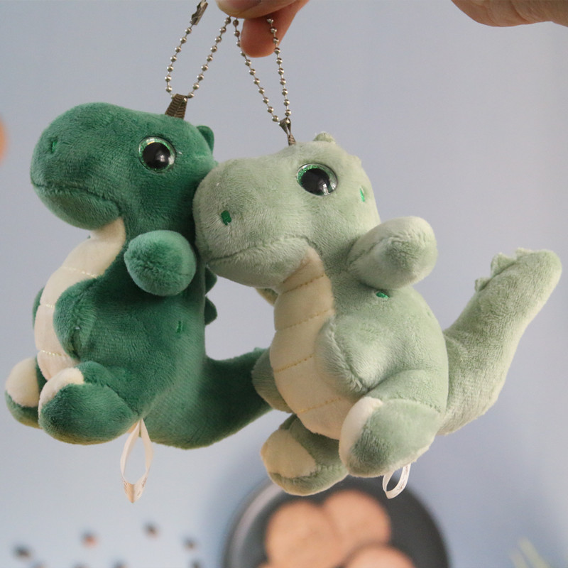 Pequeño dinosaurio muñeca de peluche llavero mochila colgante lindo Tyrannosaurus muñeca pareja mochila accesorios colgantes moda
