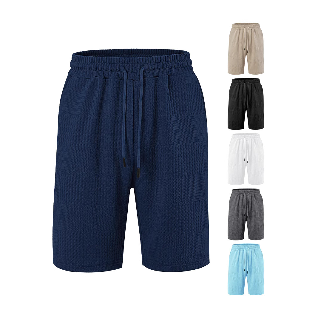 Fábrica europea de ropa de hombre transfronteriza en stock TK paleta suelta tela jacquard de banda larga de hombre pantalones cortos casuales de playa