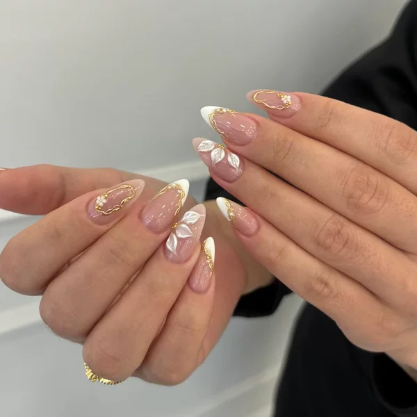 Foreign trade handmade high-end finished press-on nails in nude pink and white with carved patterns and gold plating, available for wholesale