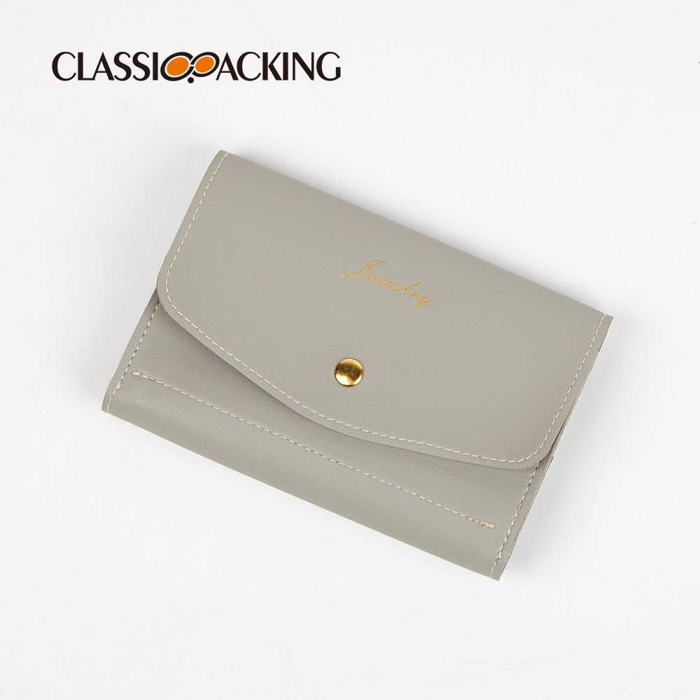 Bolsa de joyería al por mayor bolsa de almacenamiento de joyería tipo sobre plano bolsa de cosméticos de mano portátil bolsa de almacenamiento de joyería