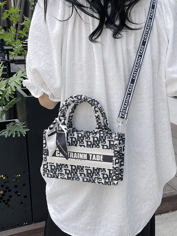 Bolsos de textura avanzada de mujeres nuevas bolsas de mano populares transfronterizas, bolsas de hombro de moda, mochila de viaje universal