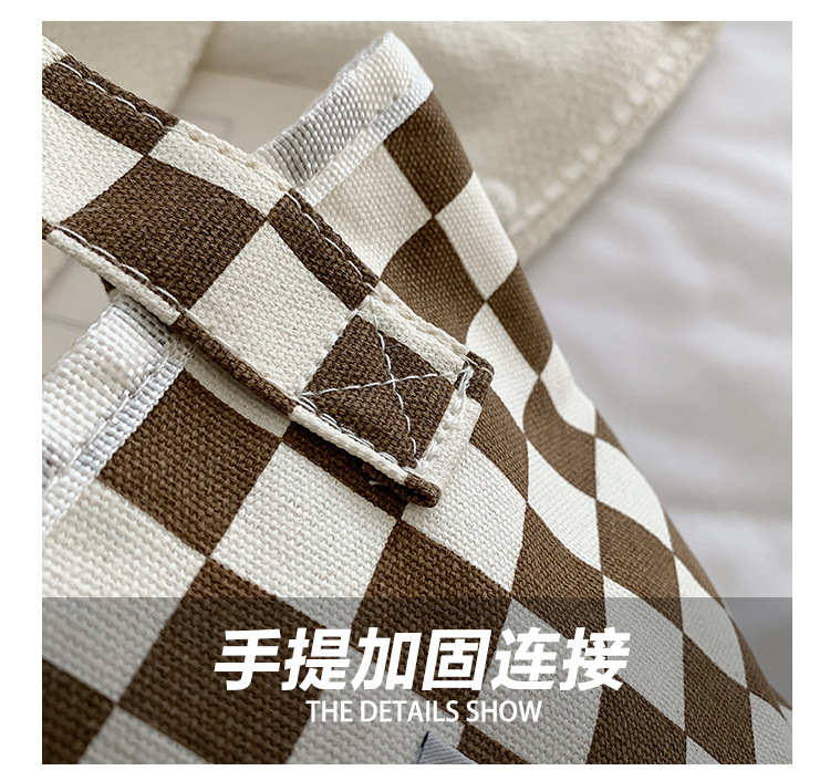 A fashionable new Japanese and Korean chic black and white checkered canvas bag, a large-capacity single-shoulder bag for women, and a simple student handbag undefined