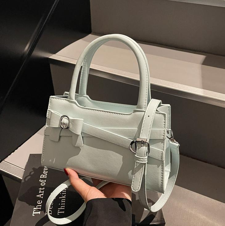 Nicho de diseño de tendencia bolso de mano para mujeres 2025 nuevo estilo de alto nivel de sensación versátil bolso de hombro casual simple bolso cuadrado