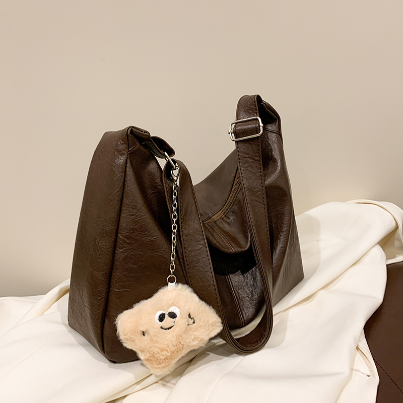 Bolso de cuero suave versátil para damas 2024 nuevo estilo retro moda bolso universitario gran capacidad de ocio