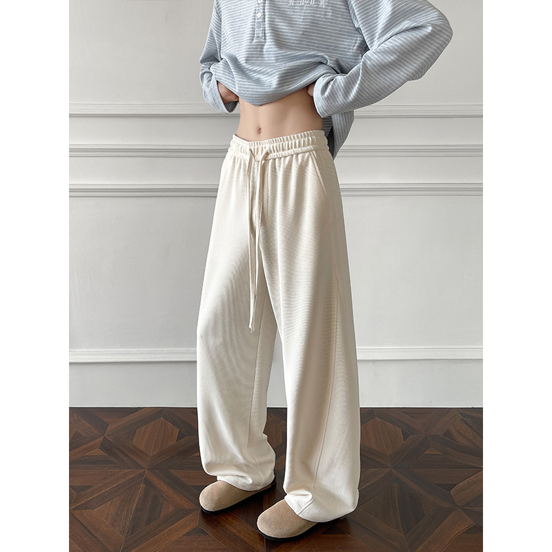 Pantaloni della tuta in stile americano con taglio obliquo e orlo curvo per uomo e donna, primavera, pesanti, vestibilità pulita, vestibilità ampia e casual di alta qualità._voghion.com