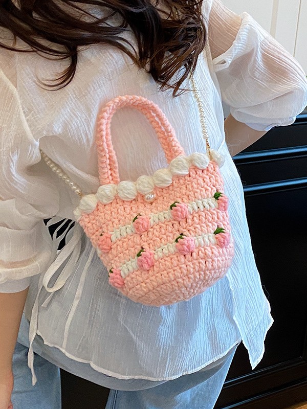 Bolso de mensajero de nicho de dopamina femenino 2025 nuevo bolso de fresa bolso tejido de vacaciones bolso de cubo bolso transfronterizo