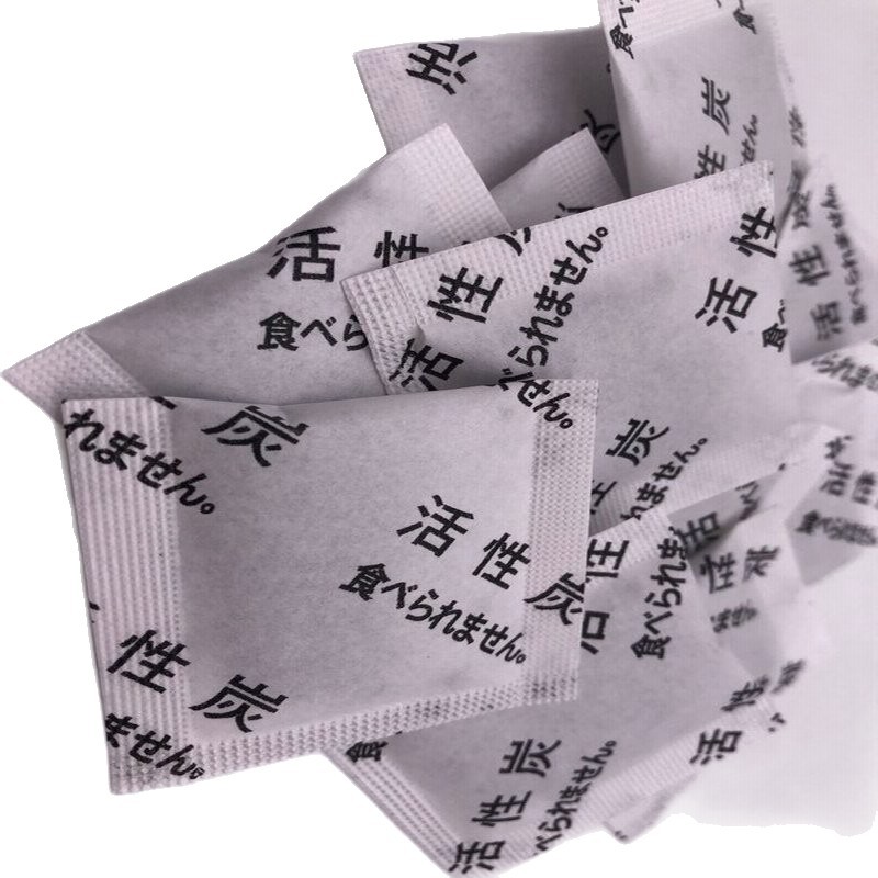 Spot 2g 3g 5g 10g chino japonés carbón activado paquete desecante taza de té paquete desodorante taza de plástico desodorante