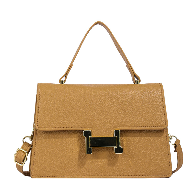 Bolso popular este año 2024 nueva textura bolso de mano cuadrado lichi patrón bolso de viaje de mujer mochila de hombro casual