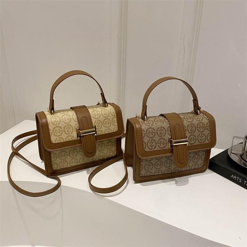 Bolsa de mano de moda coreana de moda 2025, primavera nueva bolsa de hombro de viaje de moda retro impresión mochila